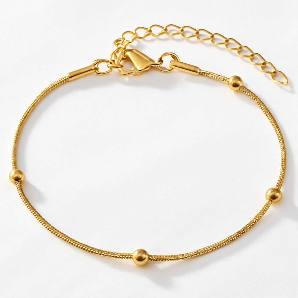 Armband mit Goldkugeln