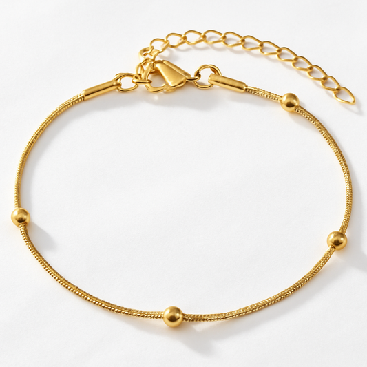Armband mit Goldkugeln
