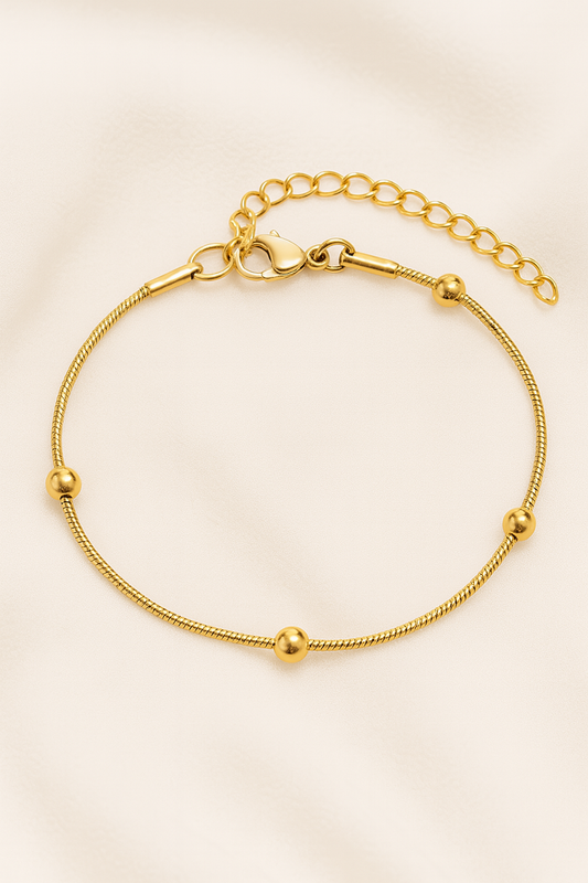Armband mit Goldkugeln